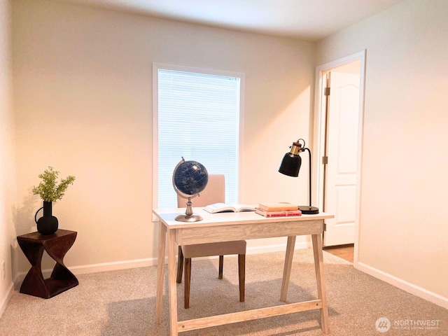 office featuring light colored carpet and baseboards