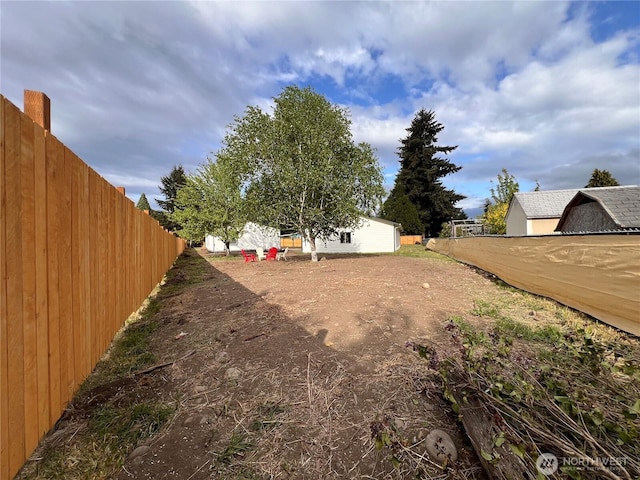 view of yard with fence