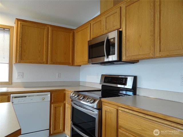1954 Meadowood Loop, Woodland, WA 98674 - kitchen featuring stainless steel appliances and light countertops