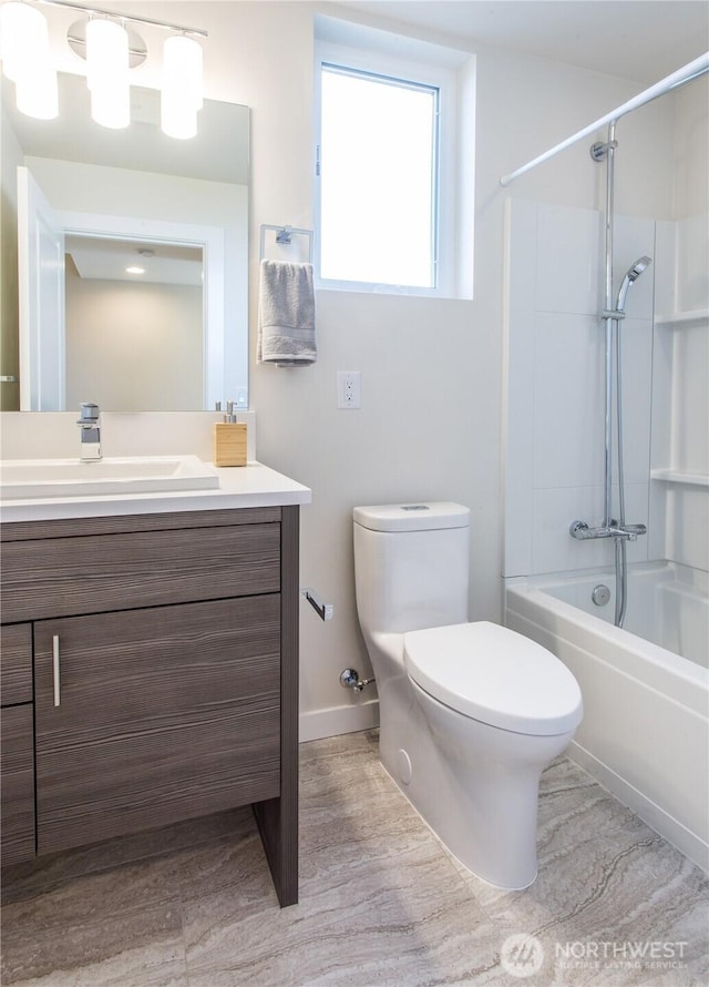 bathroom with toilet, vanity, wood finished floors, shower / bath combination, and baseboards