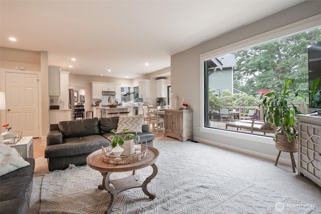 1075 SW 12th St, North Bend, WA 98045 - living room featuring recessed lighting and light carpet