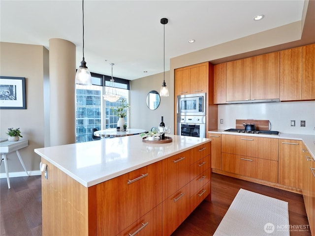 10700 NE 4th St Unit 2710, Bellevue, WA 98004 - kitchen with stainless steel appliances, modern cabinets, dark wood-type flooring, light countertops, and recessed lighting