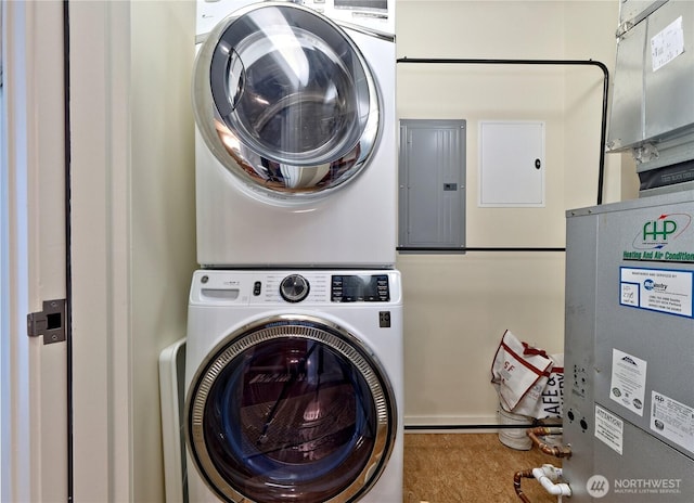 10700 NE 4th St Unit 2710, Bellevue, WA 98004 - laundry area featuring stacked washer / drying machine