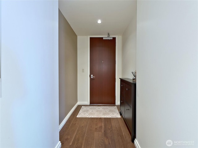 10700 NE 4th St Unit 2710, Bellevue, WA 98004 - doorway featuring dark wood-style flooring, baseboards, and recessed lighting