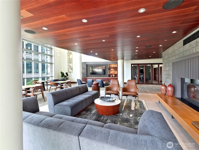10700 NE 4th St Unit 2710, Bellevue, WA 98004 - community lobby with wooden ceiling, a wall of windows, and recessed lighting