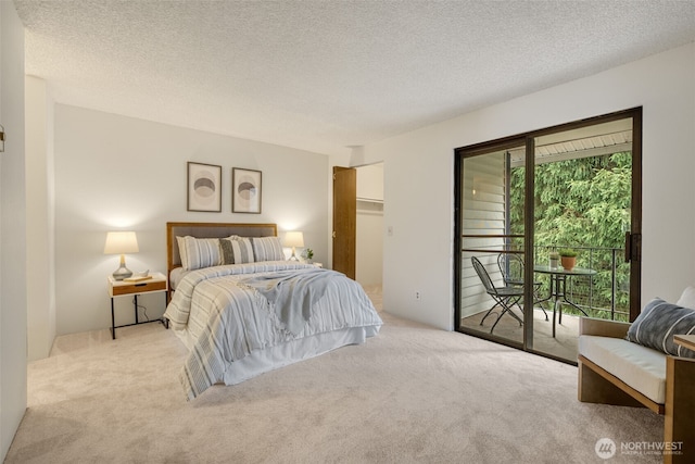 1820 SW 318th Pl Unit 26D, Federal Way, WA 98023 - carpeted bedroom with access to outside and a textured ceiling