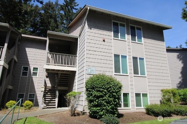 view of building exterior with stairway