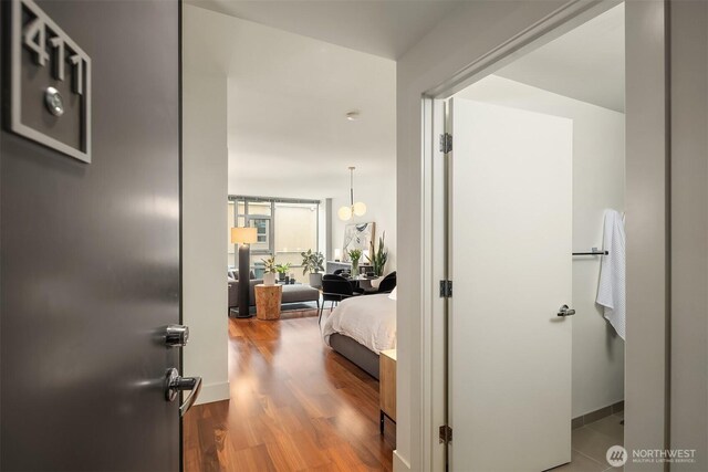 2911 2nd Ave Unit 411, Seattle, WA 98121 - corridor featuring wood finished floors