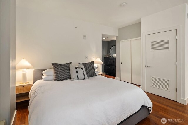 2911 2nd Ave Unit 411, Seattle, WA 98121 - bedroom with wood finished floors