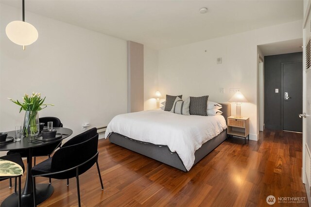 2911 2nd Ave Unit 411, Seattle, WA 98121 - bedroom featuring wood finished floors