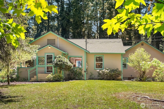 11607 SW Cove Rd, Vashon, WA 98070 - view of front of house with a front lawn and roof with shingles