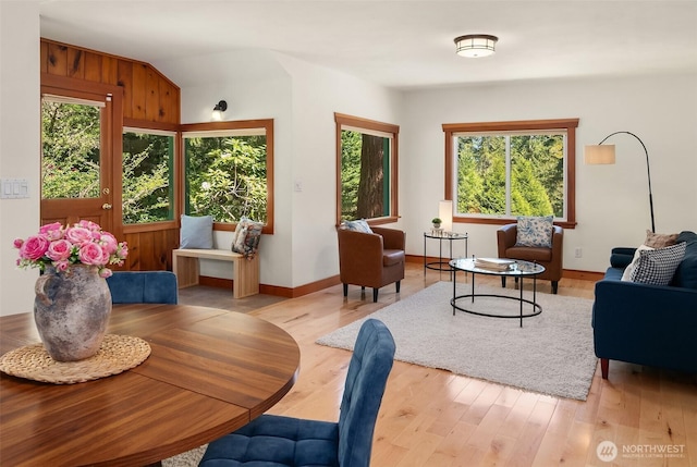 11607 SW Cove Rd, Vashon, WA 98070 - living room with healthy amount of natural light, wood finished floors, and baseboards