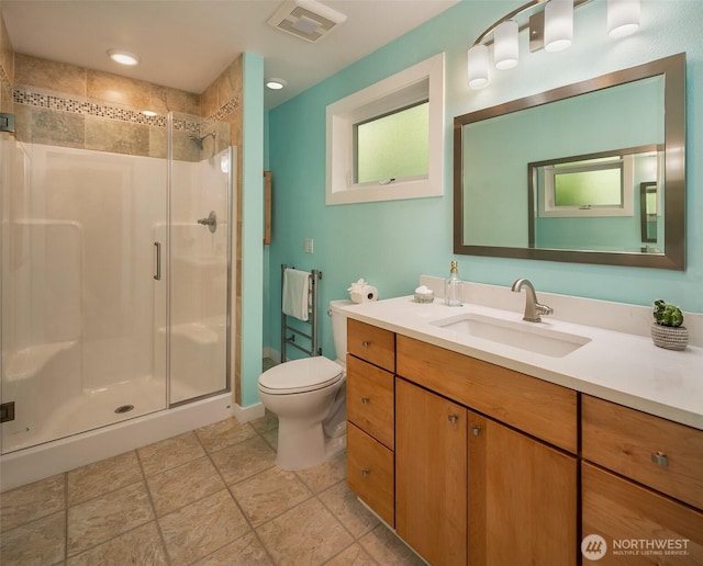 11607 SW Cove Rd, Vashon, WA 98070 - full bath featuring a stall shower, toilet, and vanity