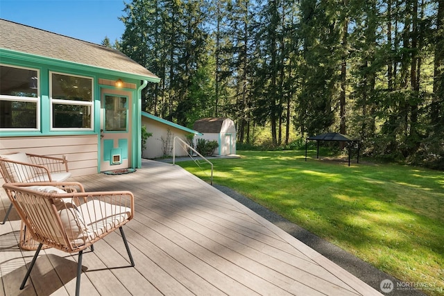 11607 SW Cove Rd, Vashon, WA 98070 - deck featuring a storage shed, a lawn, an outdoor structure, and a gazebo
