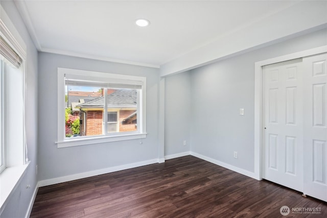 9348 54th Ave S, Seattle, WA 98118 - unfurnished room with dark wood-style flooring, baseboards, and recessed lighting