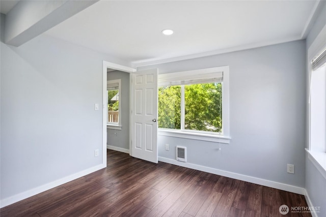 9348 54th Ave S, Seattle, WA 98118 - empty room with dark wood-type flooring, baseboards, and recessed lighting