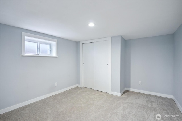 9348 54th Ave S, Seattle, WA 98118 - unfurnished bedroom featuring carpet, a closet, baseboards, and recessed lighting