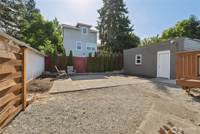 9348 54th Ave S, Seattle, WA 98118 - fenced backyard featuring a patio