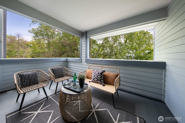 view of patio with a balcony and an outdoor hangout area