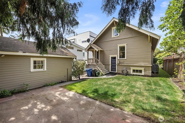 back of property featuring a patio area