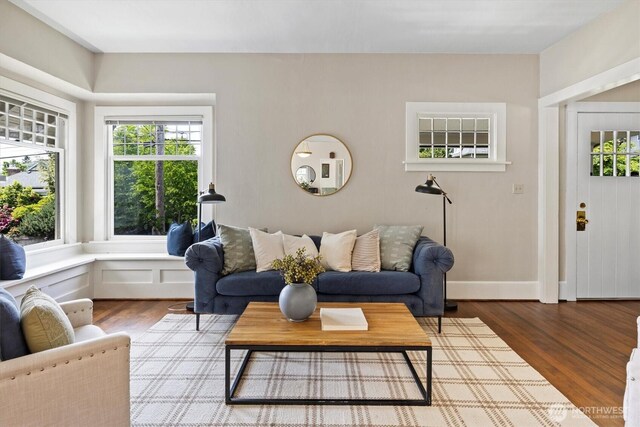 living room with wood finished floors
