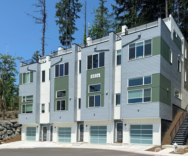 8826 NE 173rd Pl Unit B, Bothell, WA 98011 - view of property featuring a garage