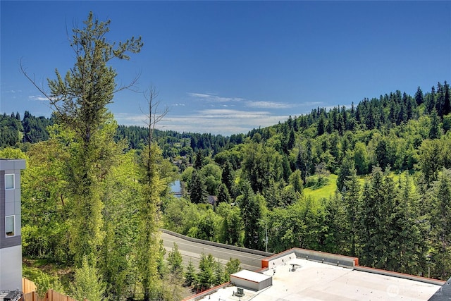 8826 NE 173rd Pl Unit B, Bothell, WA 98011 - mountain view with a heavily wooded area