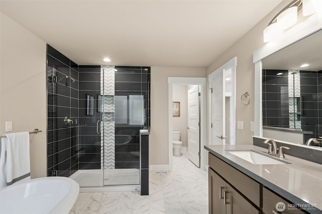 7506 172nd Street Ct E, Puyallup, WA 98375 - bathroom with marble look tile flooring, a stall shower, toilet, recessed lighting, and vanity