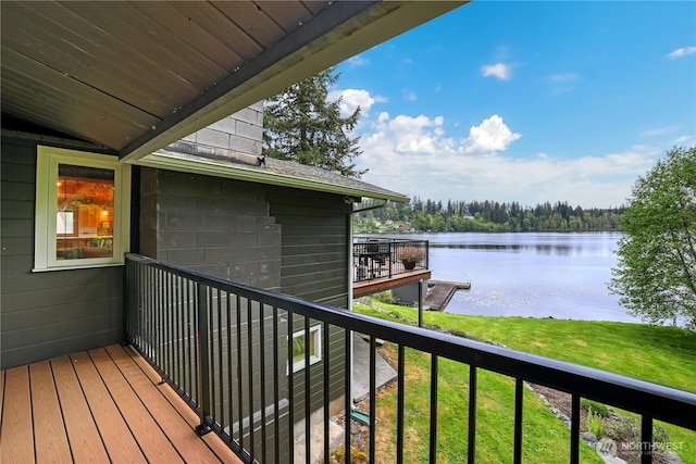 balcony featuring a water view