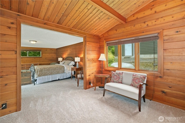 bedroom featuring carpet, wooden walls, and wooden ceiling