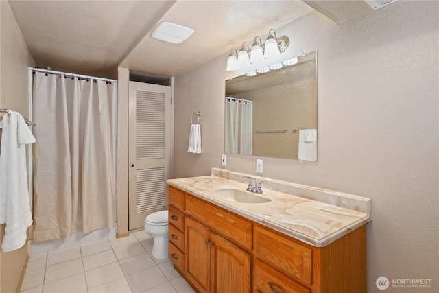full bathroom with tile patterned floors, toilet, vanity, and a shower with shower curtain