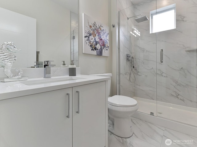 23801 100th Ave SE, Kent, WA 98031 - bathroom with a marble finish shower, marble look tile flooring, and vanity
