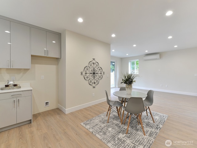 23801 100th Ave SE, Kent, WA 98031 - dining space featuring a wall mounted air conditioner, light wood-style flooring, and recessed lighting