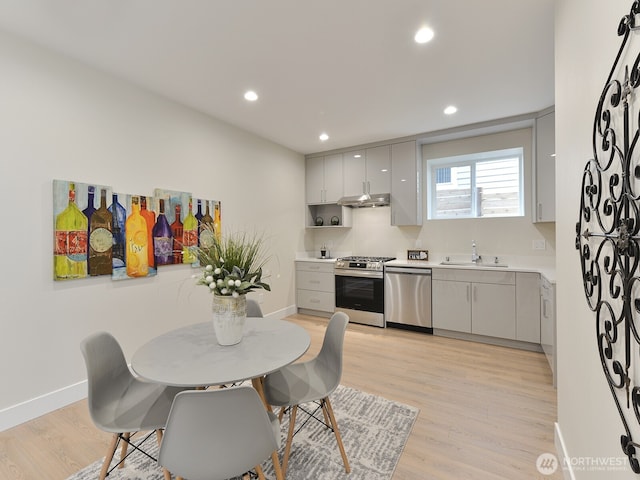23801 100th Ave SE, Kent, WA 98031 - kitchen with appliances with stainless steel finishes, under cabinet range hood, gray cabinetry, light countertops, and recessed lighting