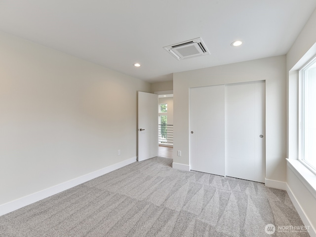 23801 100th Ave SE, Kent, WA 98031 - unfurnished bedroom with carpet floors, a closet, and recessed lighting