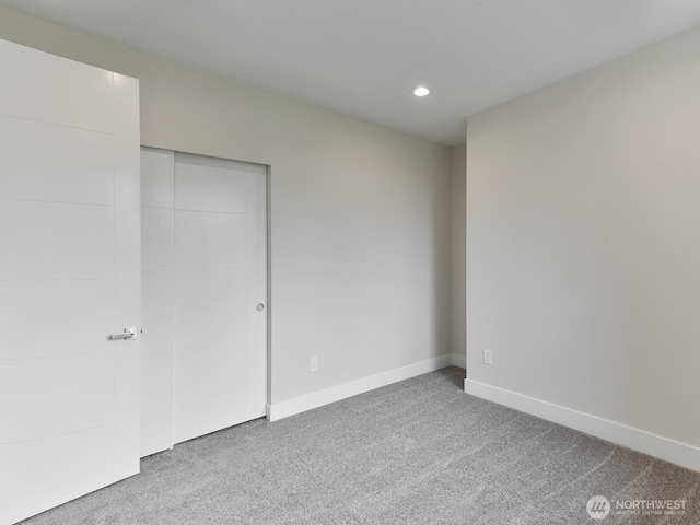 23801 100th Ave SE, Kent, WA 98031 - unfurnished bedroom featuring carpet floors, recessed lighting, and a closet