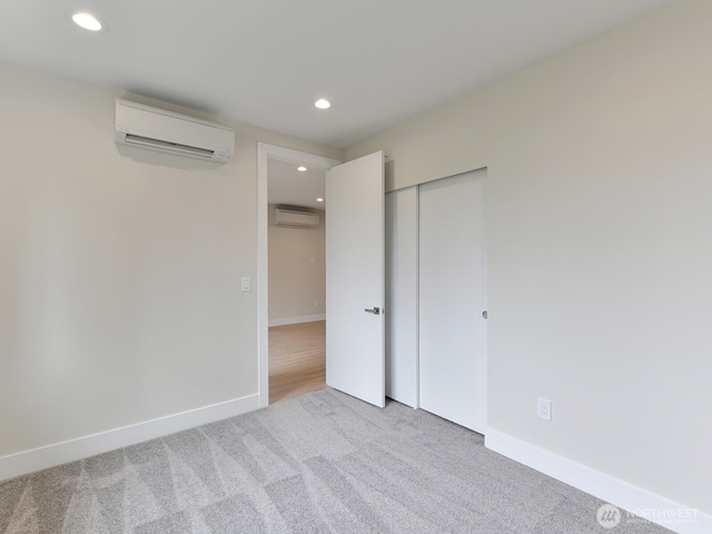 23801 100th Ave SE, Kent, WA 98031 - unfurnished bedroom featuring a wall mounted AC, a wall mounted air conditioner, carpet flooring, recessed lighting, and a closet