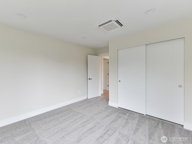 23801 100th Ave SE, Kent, WA 98031 - unfurnished bedroom with carpet flooring, a closet, and recessed lighting