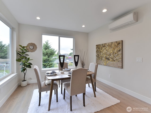 23801 100th Ave SE, Kent, WA 98031 - dining area featuring a wall unit AC, light wood-style flooring, plenty of natural light, and recessed lighting