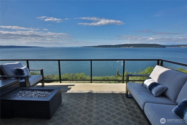 3139 Saratoga Rd, Langley, WA 98260 - balcony featuring a fire pit and a water view