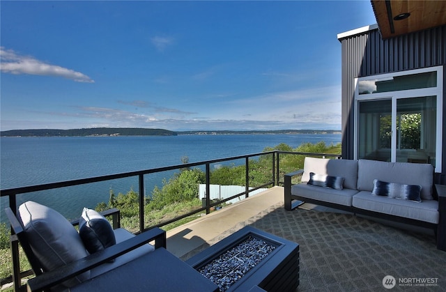 3139 Saratoga Rd, Langley, WA 98260 - balcony featuring an outdoor living space with a fire pit and a water view