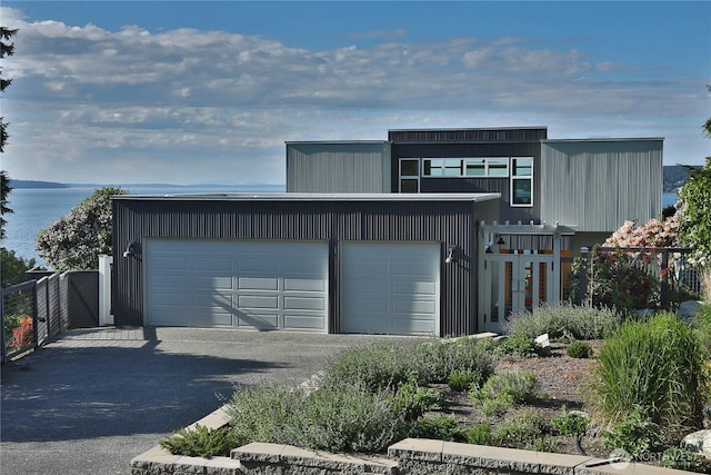 3139 Saratoga Rd, Langley, WA 98260 - garage with fence and asphalt driveway