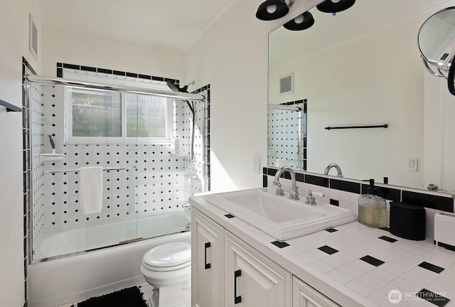 3139 Saratoga Rd, Langley, WA 98260 - bathroom with shower / bath combination with glass door, toilet, and vanity