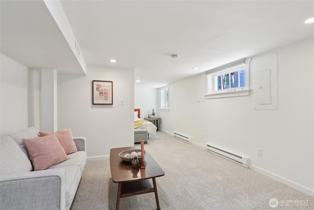 carpeted living room with a baseboard radiator, recessed lighting, and baseboards