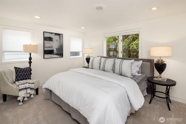 bedroom with carpet floors and recessed lighting