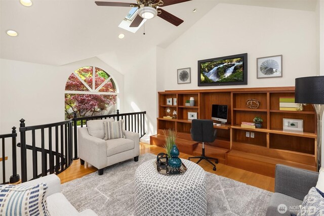 office area featuring a ceiling fan, wood finished floors, recessed lighting, and high vaulted ceiling