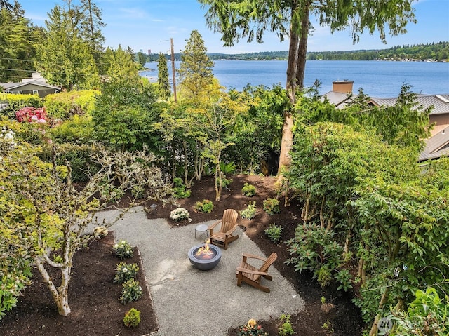 view of patio / terrace with a water view