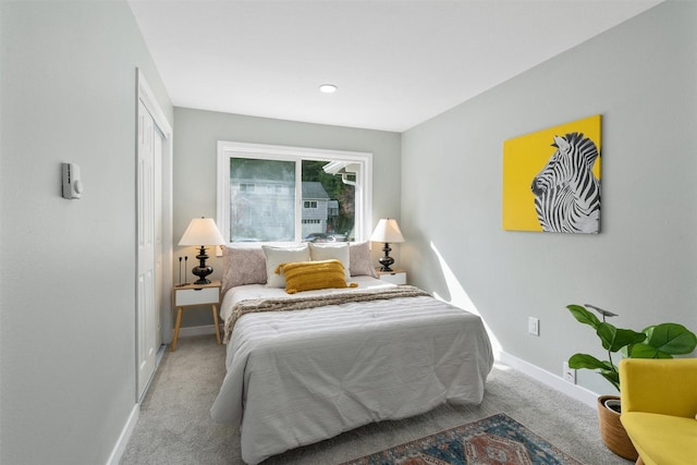 bedroom featuring baseboards, carpet floors, and recessed lighting