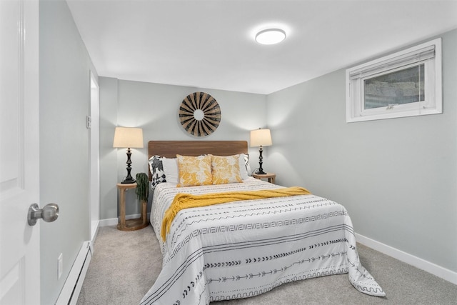 carpeted bedroom with baseboards and a baseboard radiator