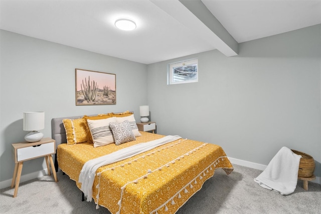 bedroom featuring carpet floors, baseboards, and beamed ceiling